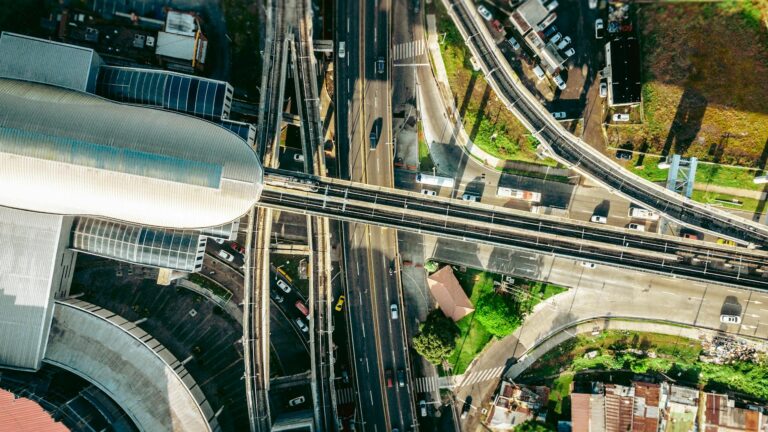 Aerial view showcasing Panama City's complex urban infrastructure with highways and buildings.